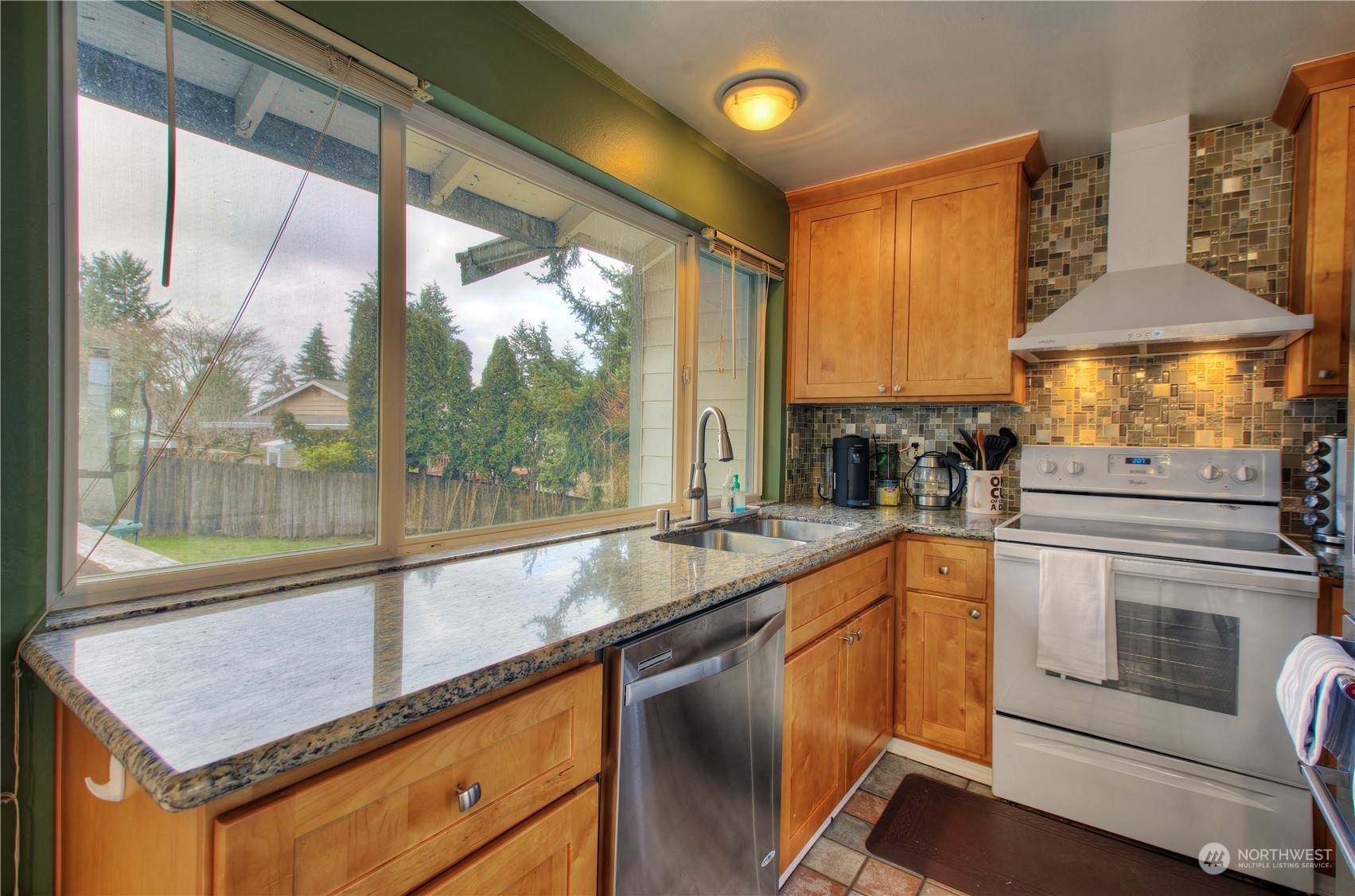 32607 35th Avenue Southwest Federal Way, WA 98023 - Photo 10 of 24 a kitchen with a sink and large window