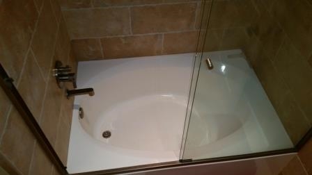 14229 Legacy Lane El Cajon, CA 92021 - Photo 14 of 25 Master Bath showcases a Large oval tub, double sinks, dual flush Toto toilet, custom built in cabinetry and beautiful porcelain tile.
