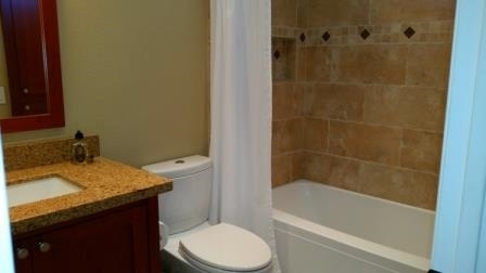 14229 Legacy Lane El Cajon, CA 92021 - Photo 16 of 25 Second Full Bathroom, custom cabinetry, dual flush Toto toilet, designer tile and lighting.