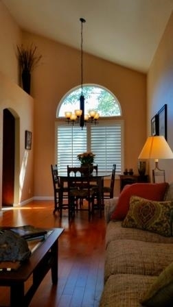 View from spacious living room into gorgeous dining room.