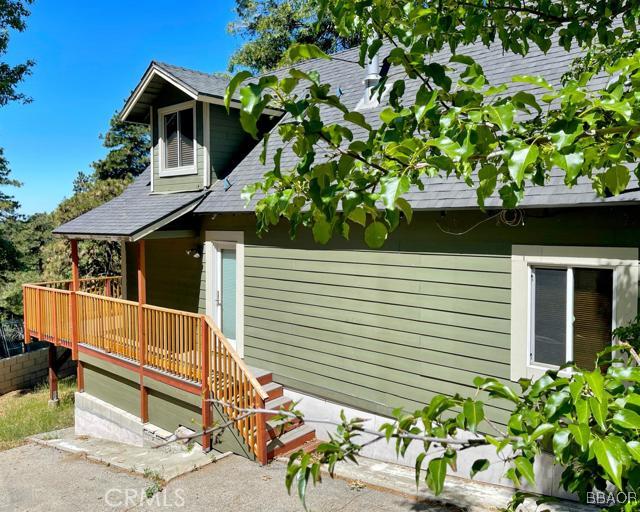 22013 Mojave River Road Cedarpines Park, CA 92322 - Photo 1 of 22 a view of house with a yard and potted plants