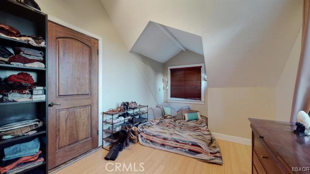 22013 Mojave River Road Cedarpines Park, CA 92322 - Photo 15 of 22 a living room with furniture and a flat screen tv