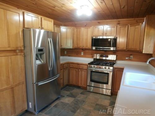 1054 Legion Road Owosso, MI 48867 - Photo 6 of 28 31257481-5.JPG