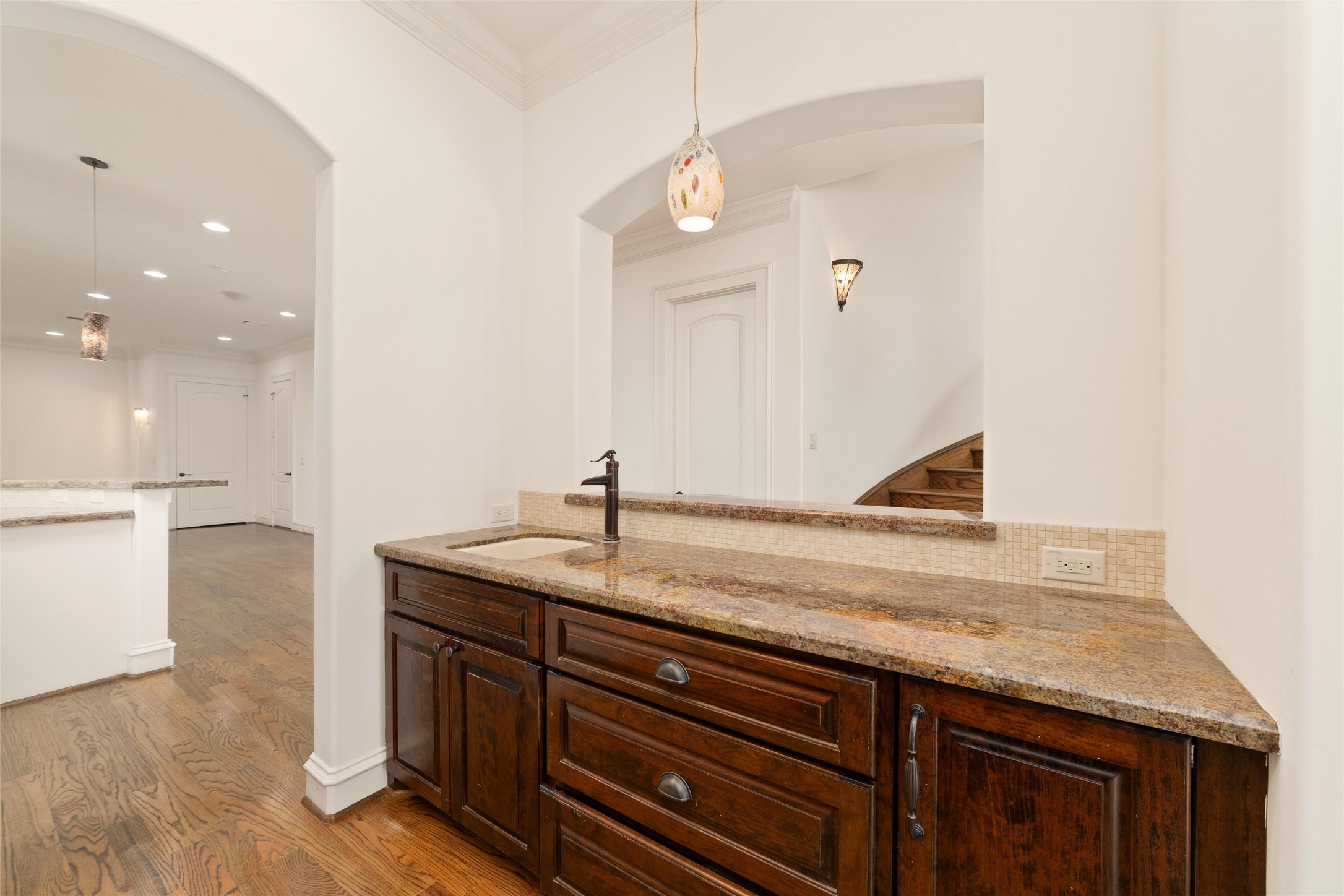 4102 Gramercy Street Houston, TX 77025 - Photo 14 of 35 a bathroom with a granite countertop sink and a mirror
