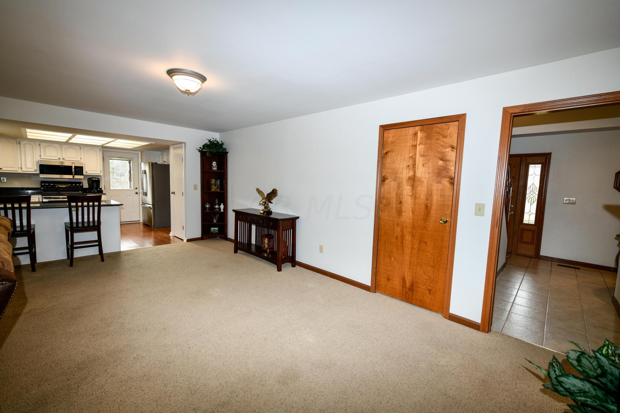 25210 Coder-Holloway Road Raymond, OH 43067 - Photo 21 of 53 Door to Full Basement