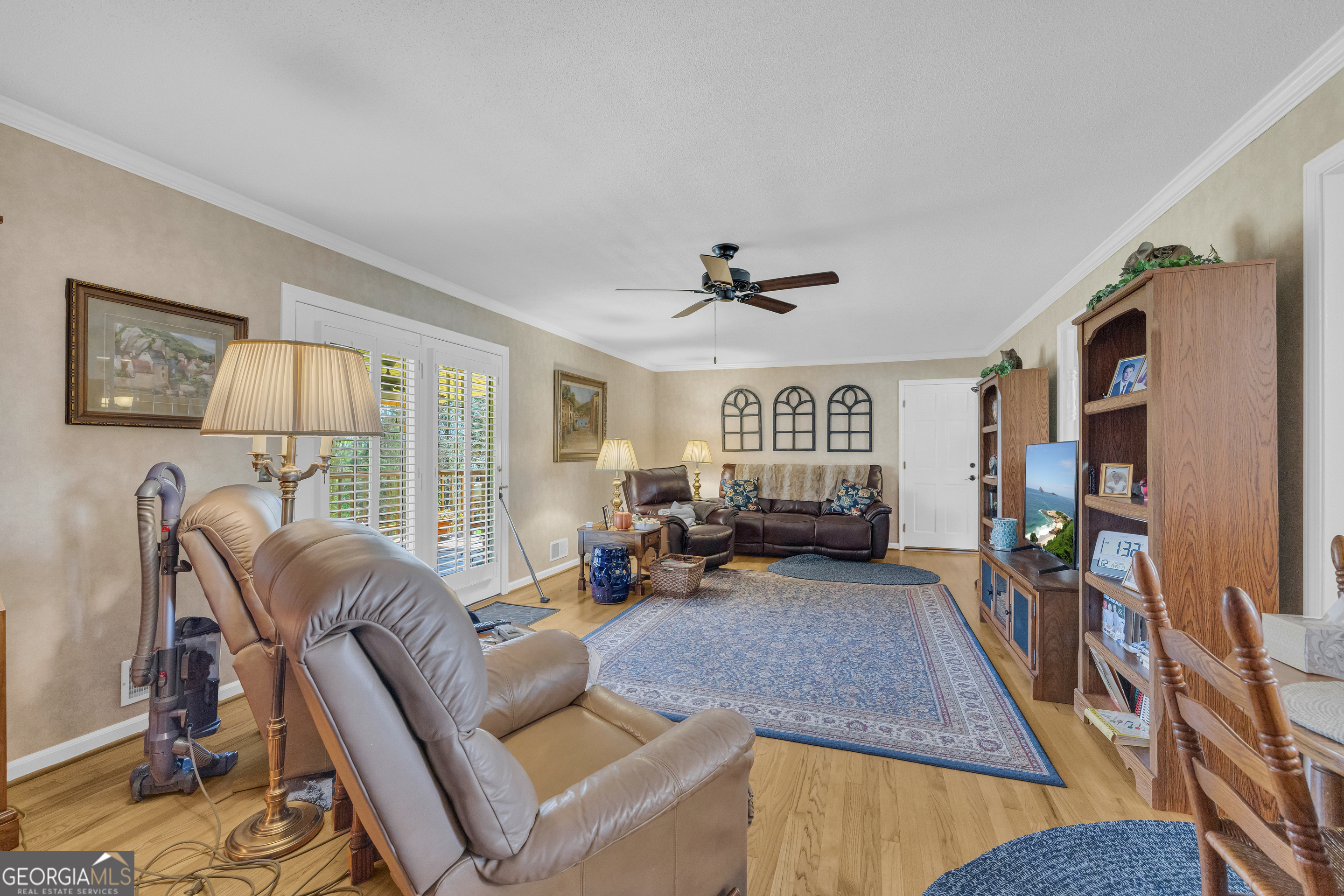 80 Riverbend Circle Royston, GA 30662 - Photo 11 of 70 a living room with furniture and a flat screen tv