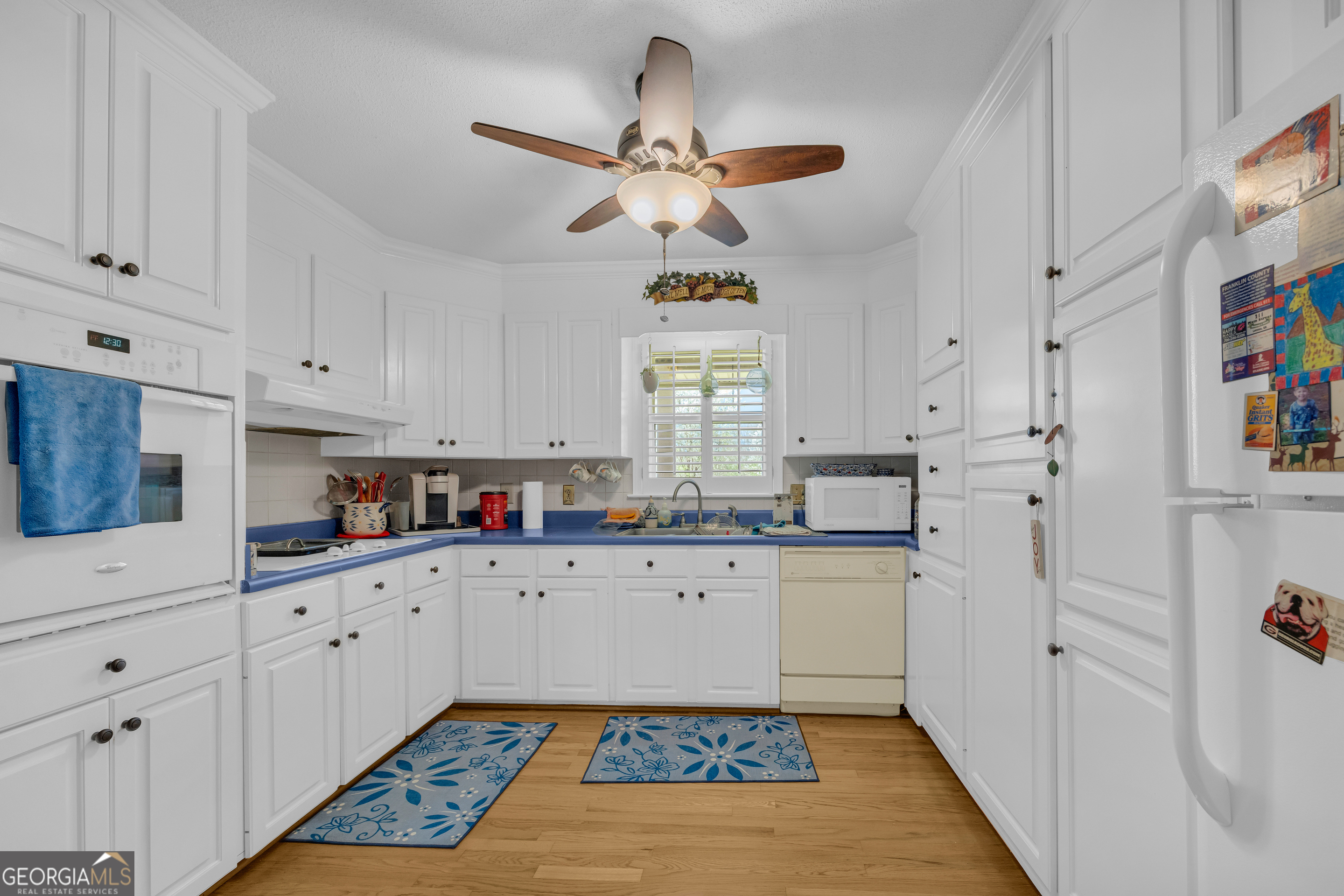 80 Riverbend Circle Royston, GA 30662 - Photo 13 of 70 a kitchen with stainless steel appliances white cabinets and a window