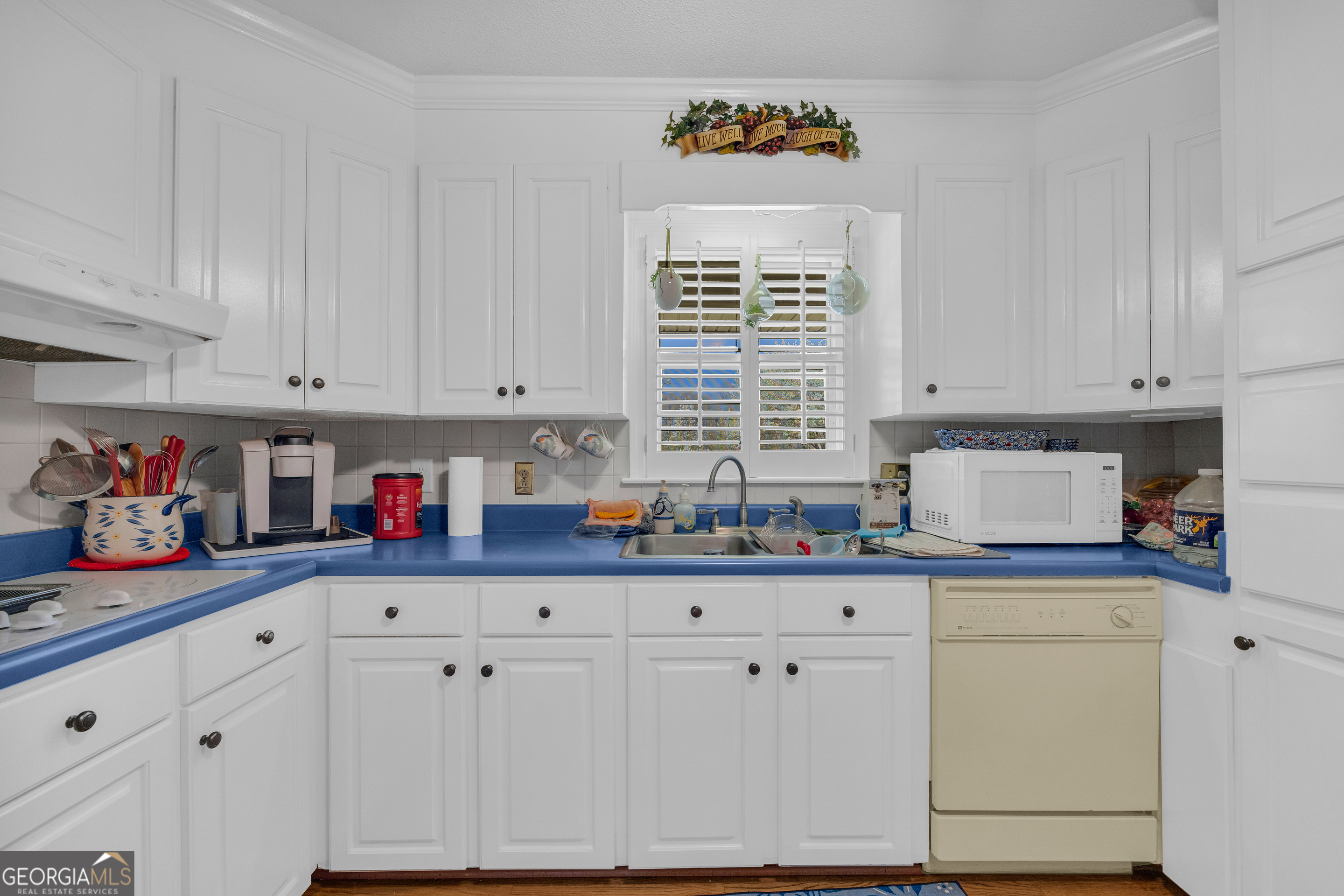80 Riverbend Circle Royston, GA 30662 - Photo 15 of 70 a kitchen with granite countertop white cabinets and white appliances