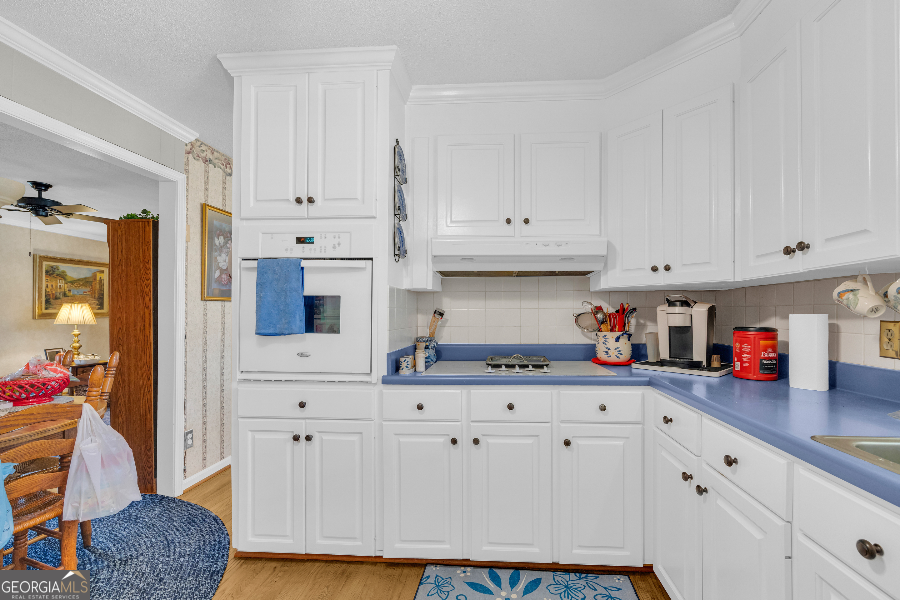 80 Riverbend Circle Royston, GA 30662 - Photo 17 of 70 a kitchen with granite countertop white cabinets and white appliances