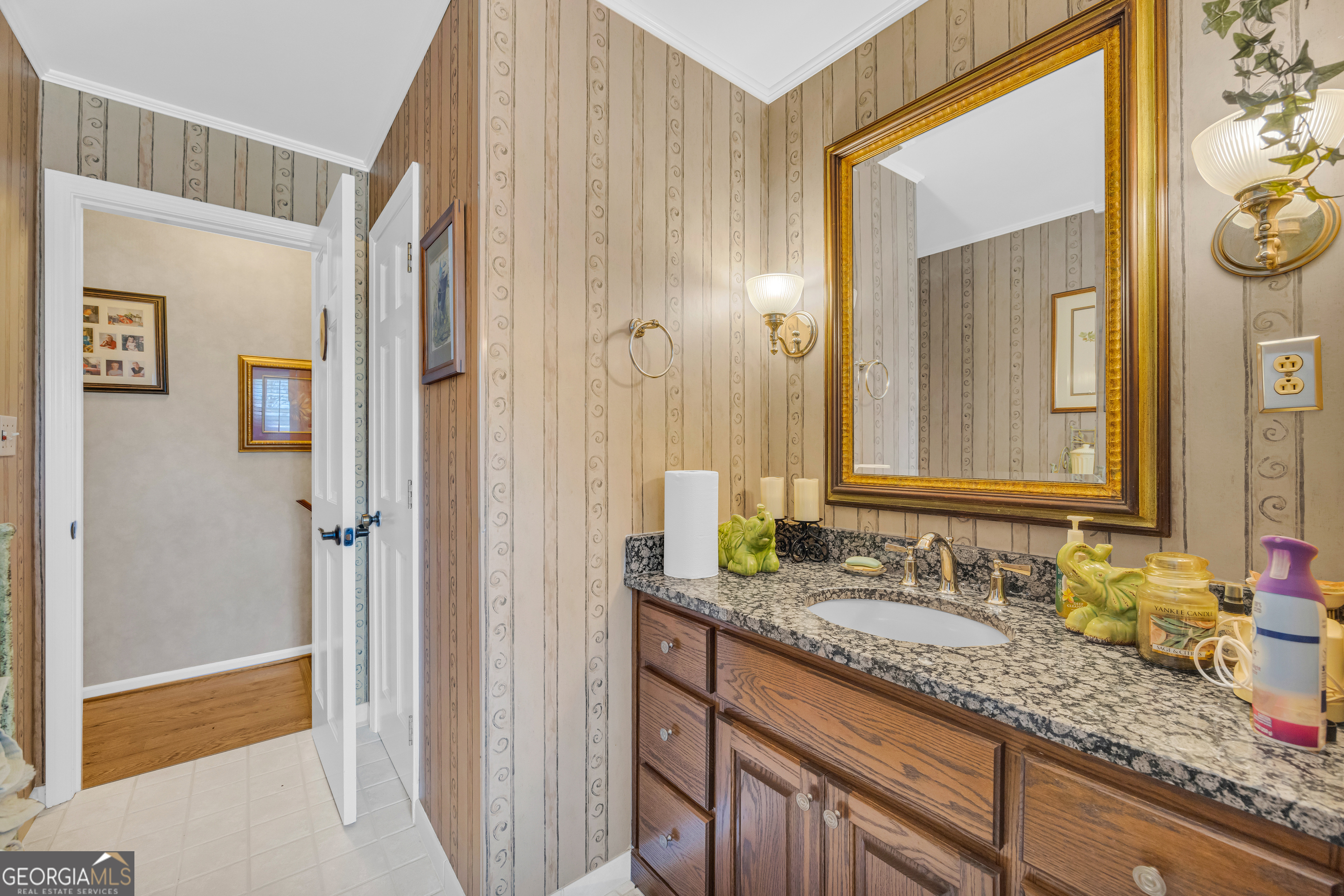 80 Riverbend Circle Royston, GA 30662 - Photo 22 of 70 a bathroom with a granite countertop sink and a mirror