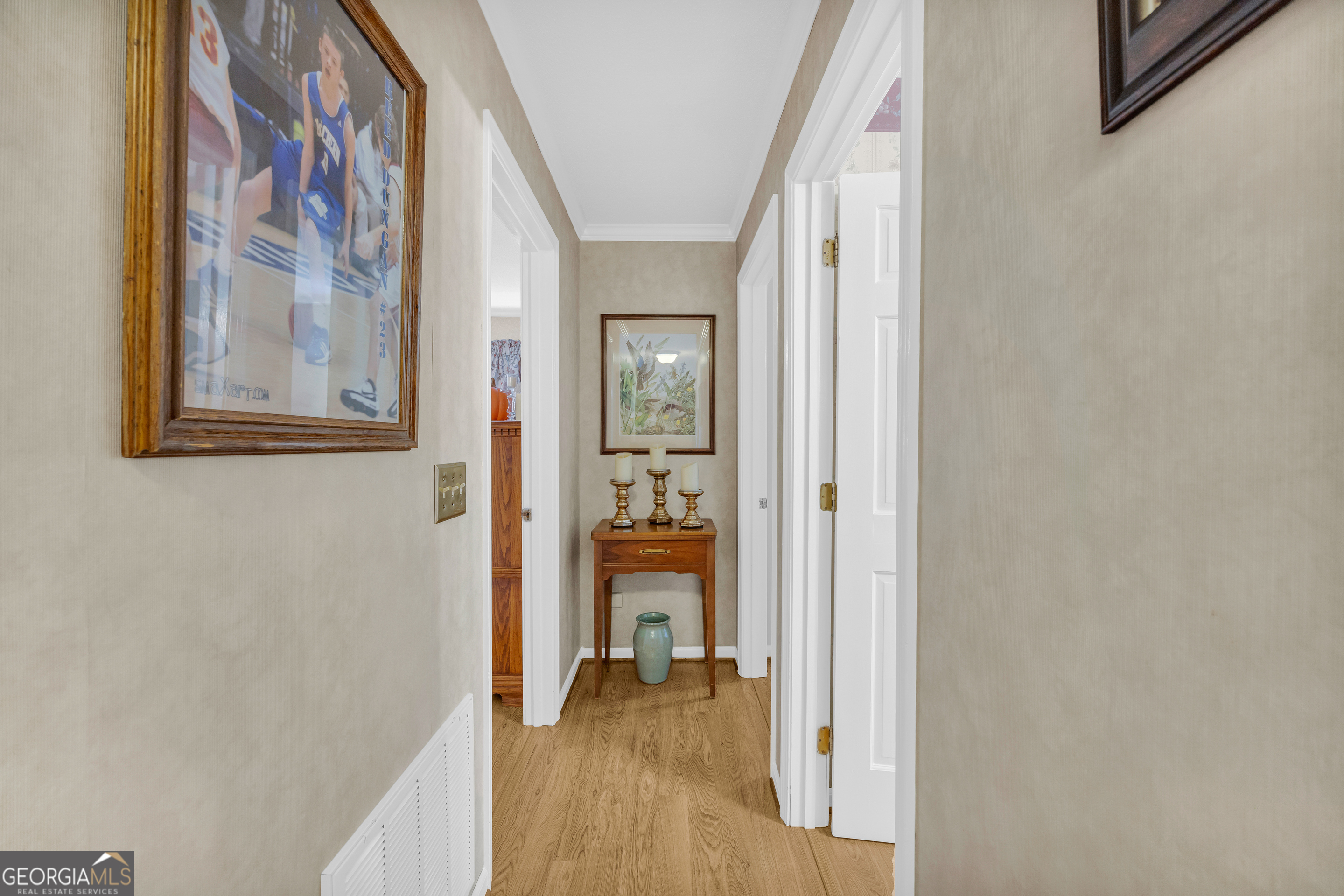 80 Riverbend Circle Royston, GA 30662 - Photo 23 of 70 a view of a hallway with wooden floor and a bathroom