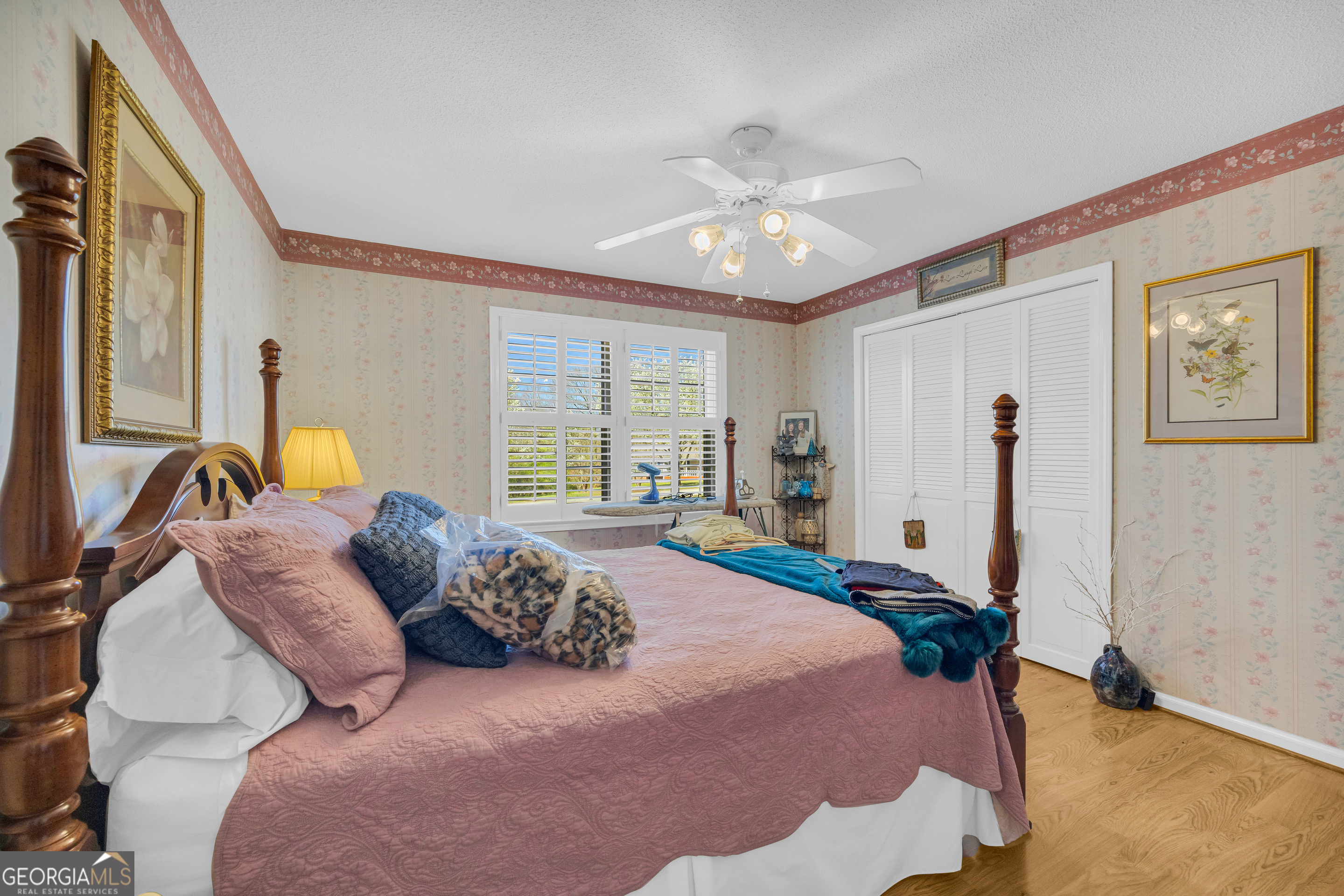 80 Riverbend Circle Royston, GA 30662 - Photo 24 of 70 a bedroom with a bed and wooden floor