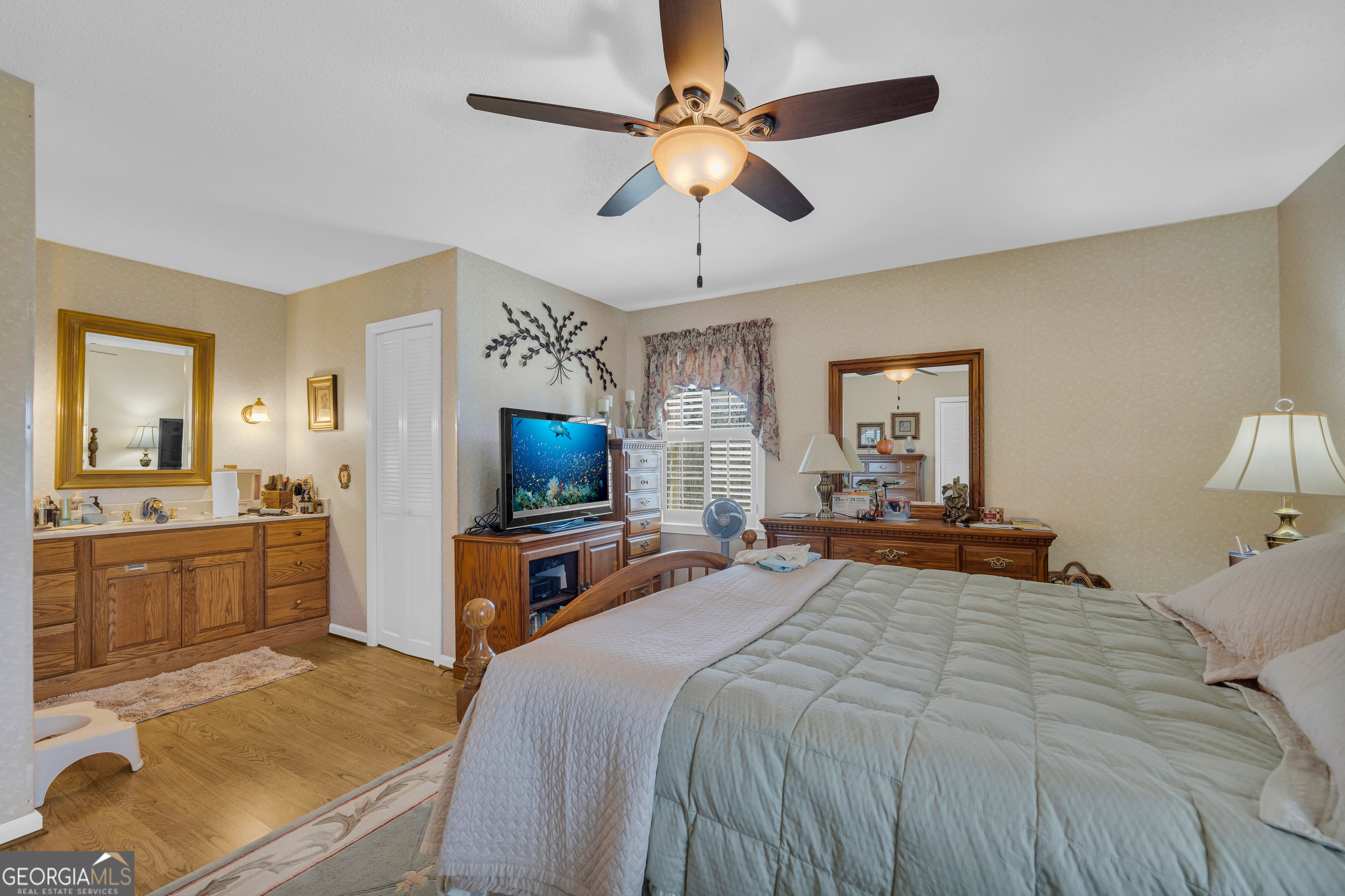 80 Riverbend Circle Royston, GA 30662 - Photo 29 of 70 a bedroom with a bed and a flat screen tv