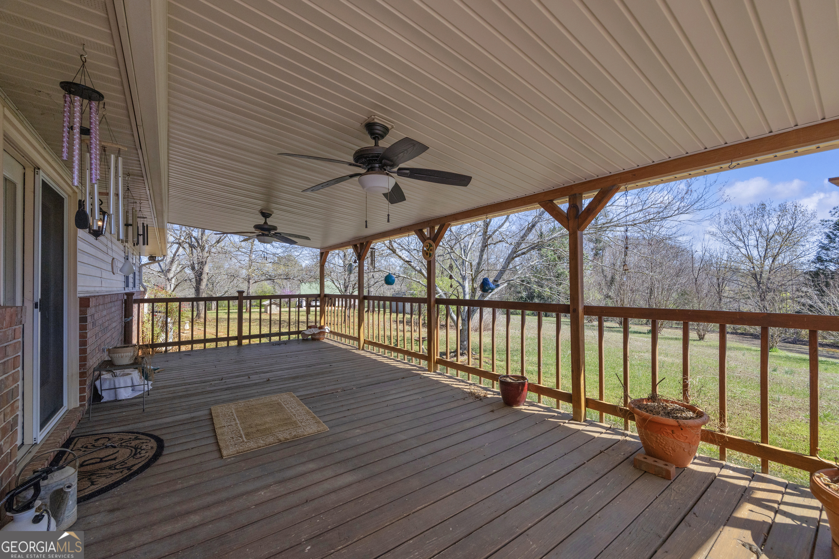 80 Riverbend Circle Royston, GA 30662 - Photo 39 of 70 a view of a balcony with wooden floor