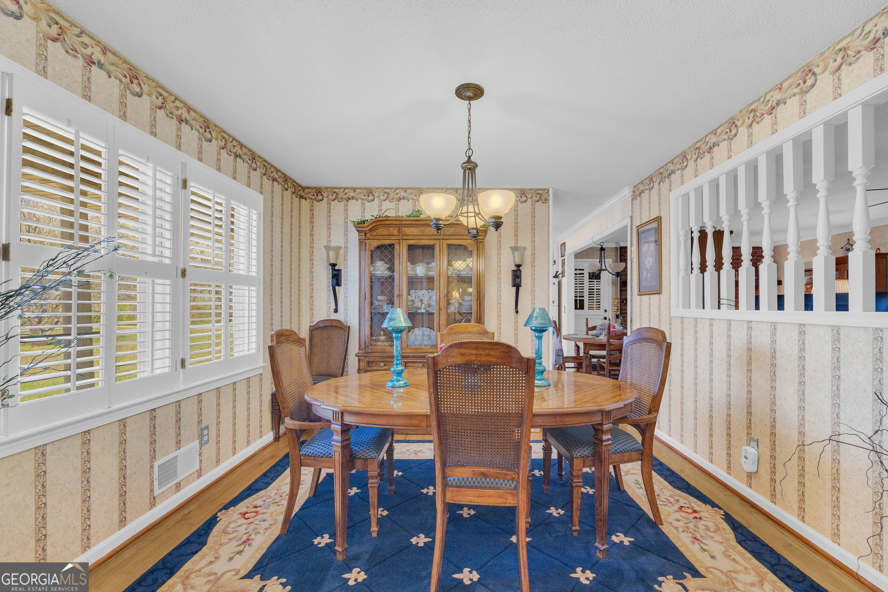 80 Riverbend Circle Royston, GA 30662 - Photo 4 of 70 a view of a dining room with furniture window and wooden floor
