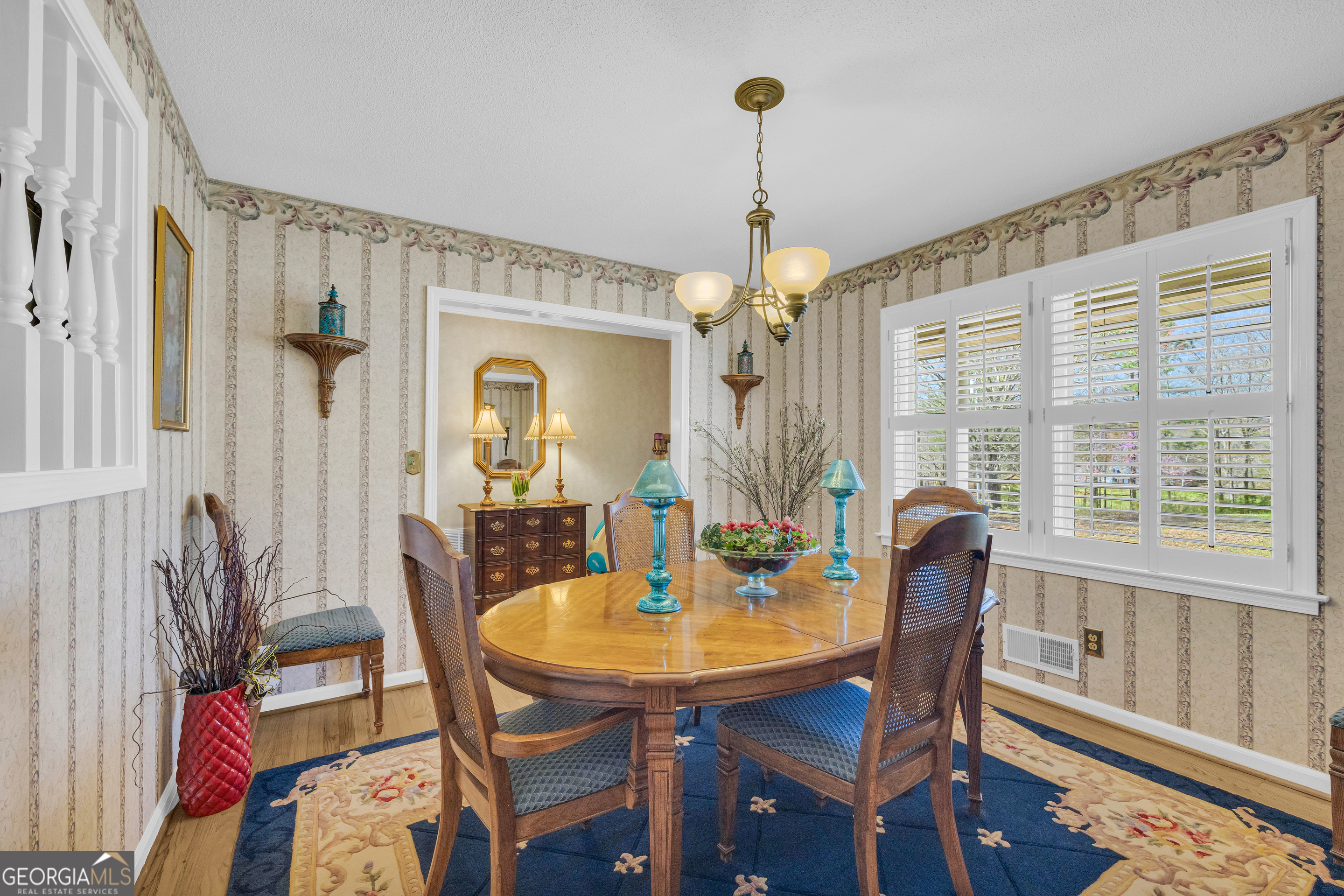 80 Riverbend Circle Royston, GA 30662 - Photo 6 of 70 a view of a dining room with furniture window and wooden floor