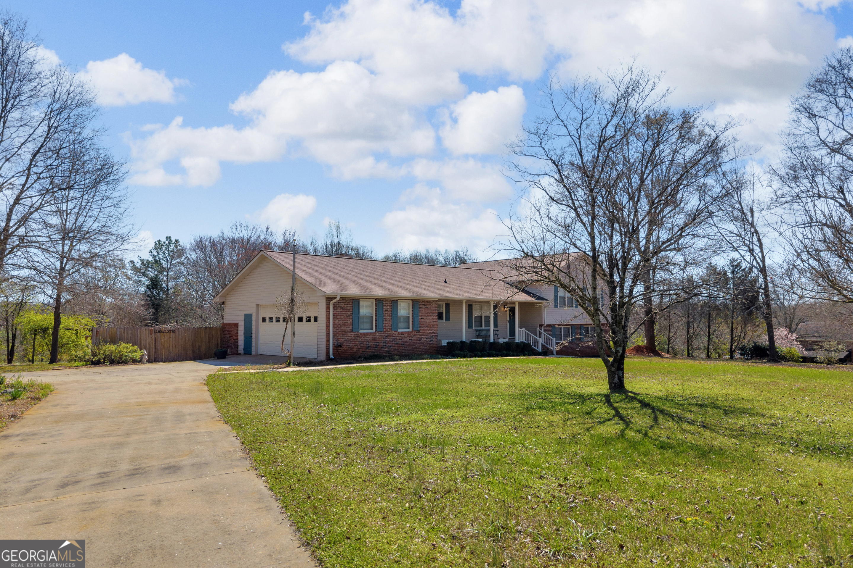 80 Riverbend Circle Royston, GA 30662 - Photo 62 of 70 a view of a house with a big yard and large trees