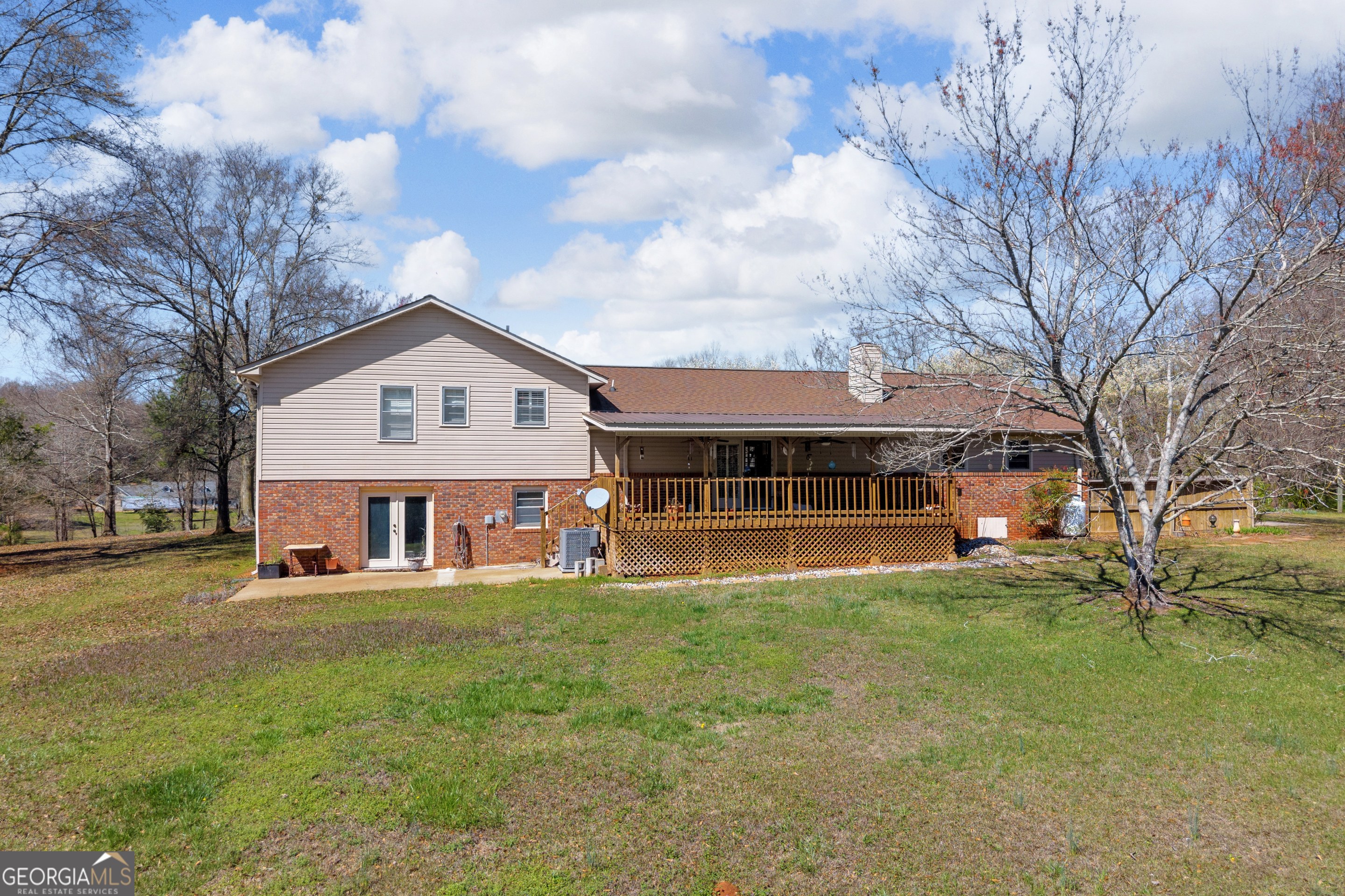 80 Riverbend Circle Royston, GA 30662 - Photo 64 of 70 a view of a house with a big yard and large trees