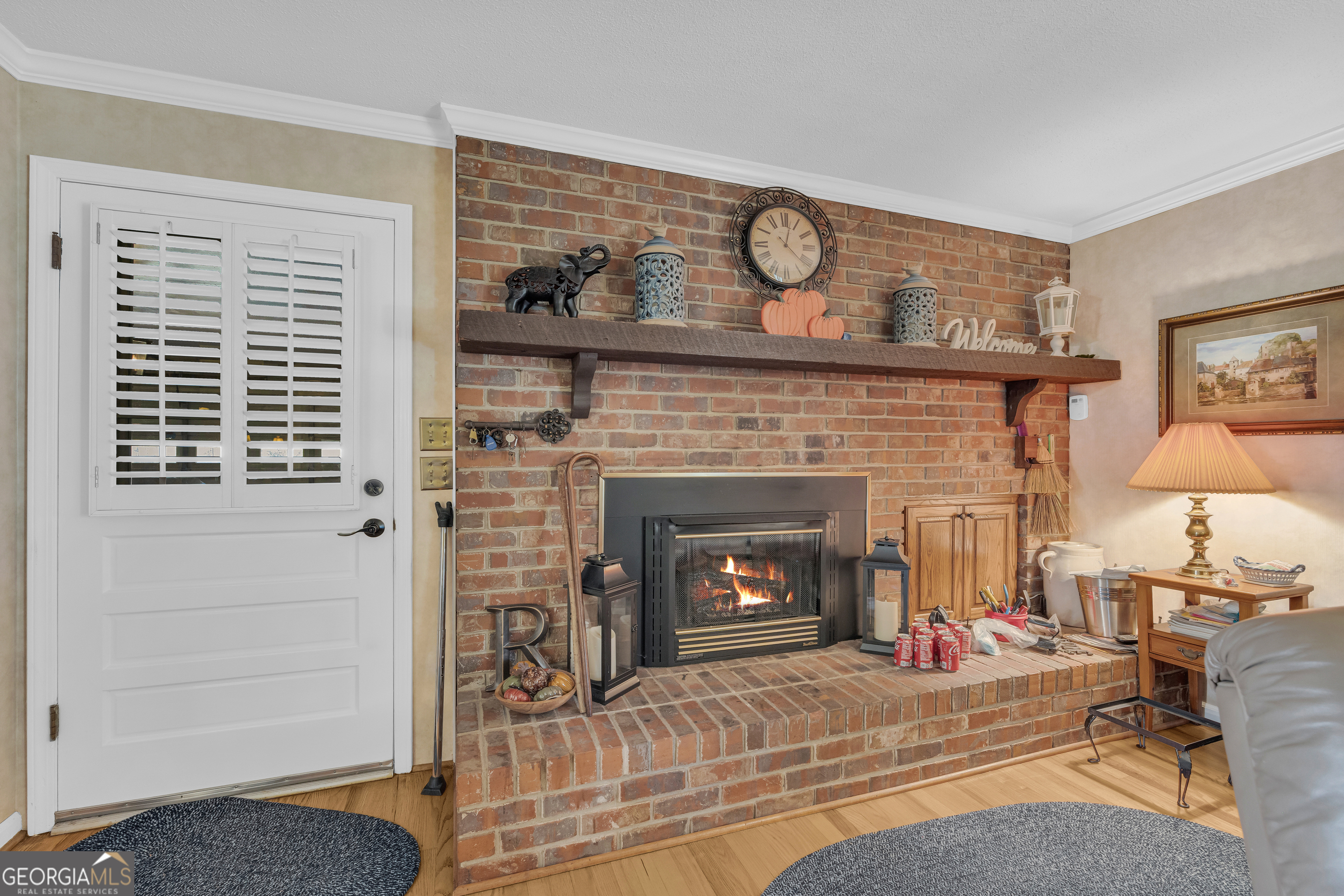 80 Riverbend Circle Royston, GA 30662 - Photo 10 of 70 a living room with furniture and a fireplace