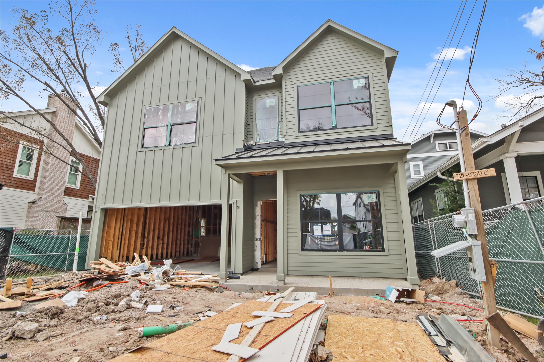 715 Merrill Street Houston, TX 77009 - Photo 1 of 50 a front view of a house with a yard