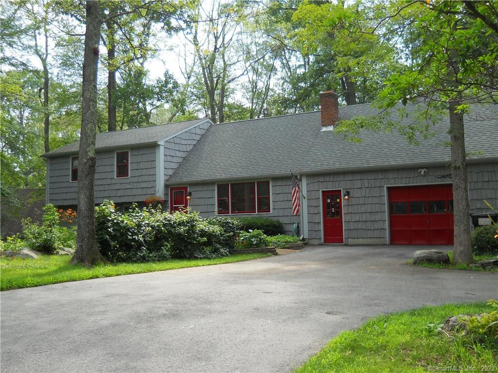 283 Plains Road Haddam, CT 06438 - Photo 1 of 1 a front view of a house with a garden