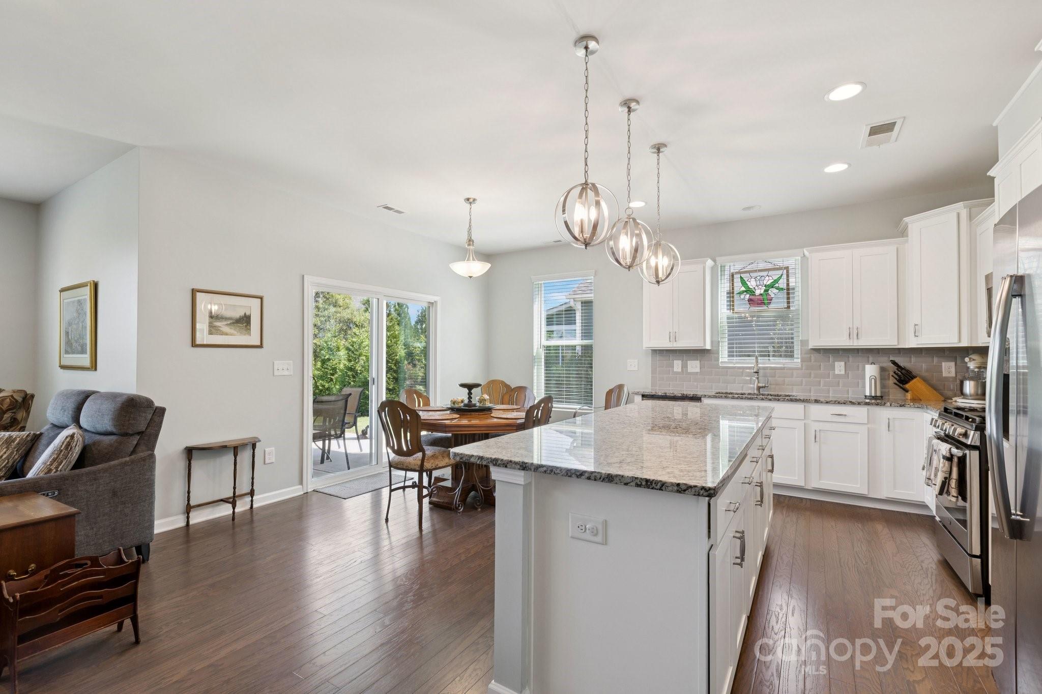 4236 Merrivale Drive Lancaster, SC 29720 - Photo 16 of 48 a large kitchen with a table and chairs