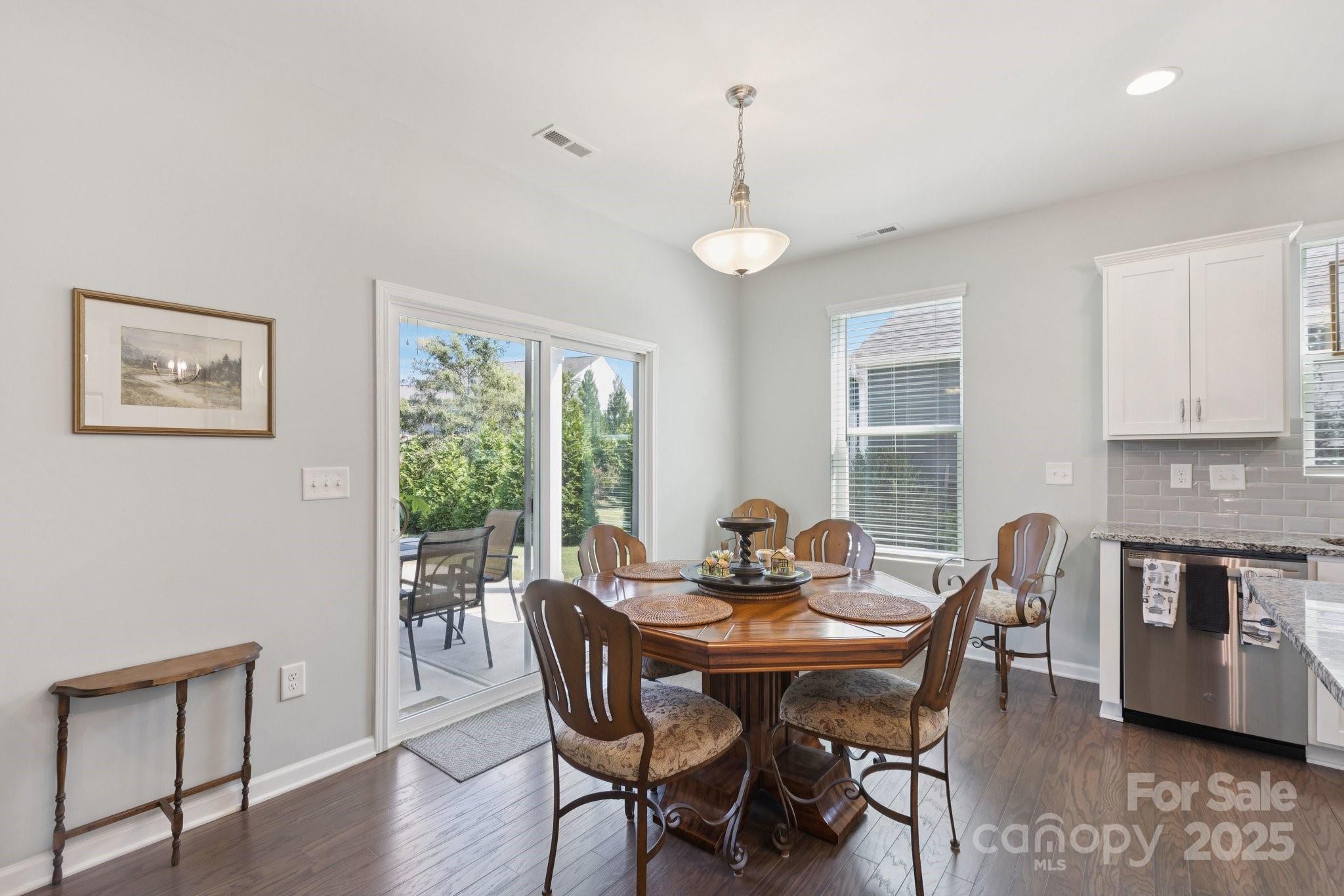 4236 Merrivale Drive Lancaster, SC 29720 - Photo 17 of 48 a view of a dining room with furniture window and wooden floor