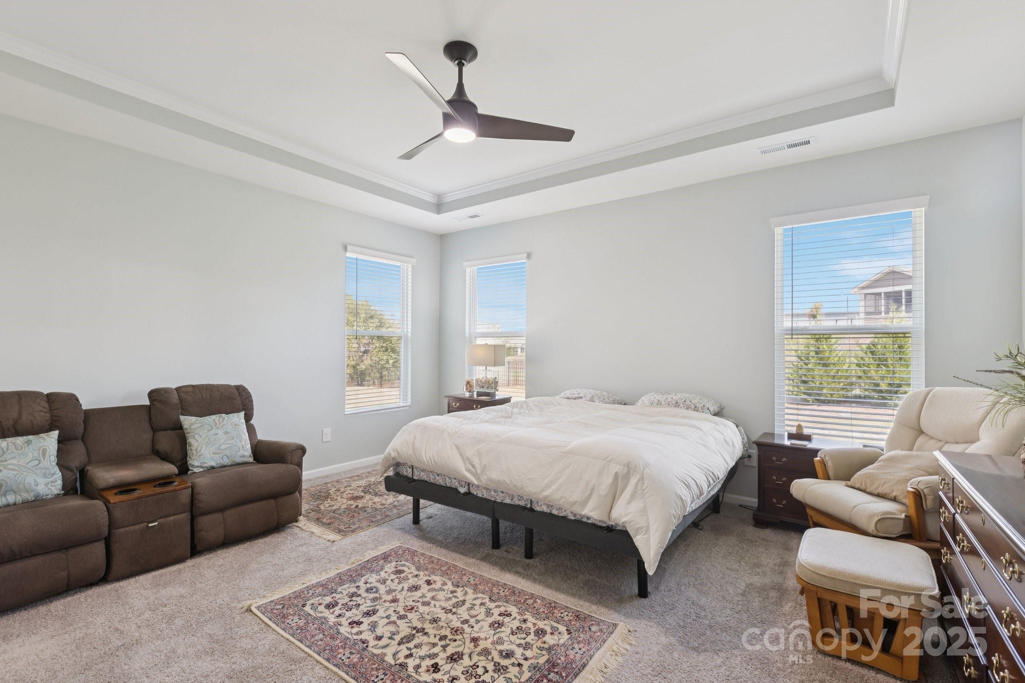 4236 Merrivale Drive Lancaster, SC 29720 - Photo 19 of 48 a bedroom with a bed a couch and a couch