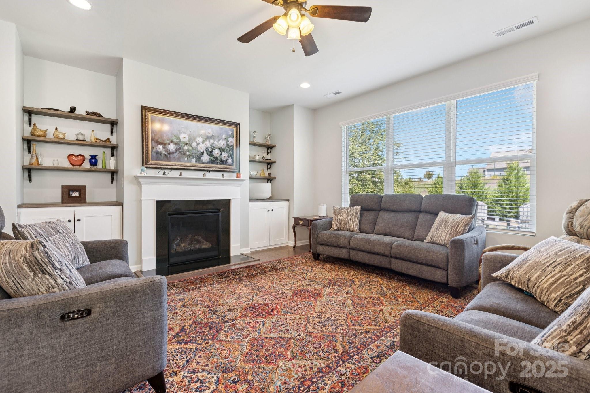 4236 Merrivale Drive Lancaster, SC 29720 - Photo 4 of 48 a living room with furniture a window and a fireplace