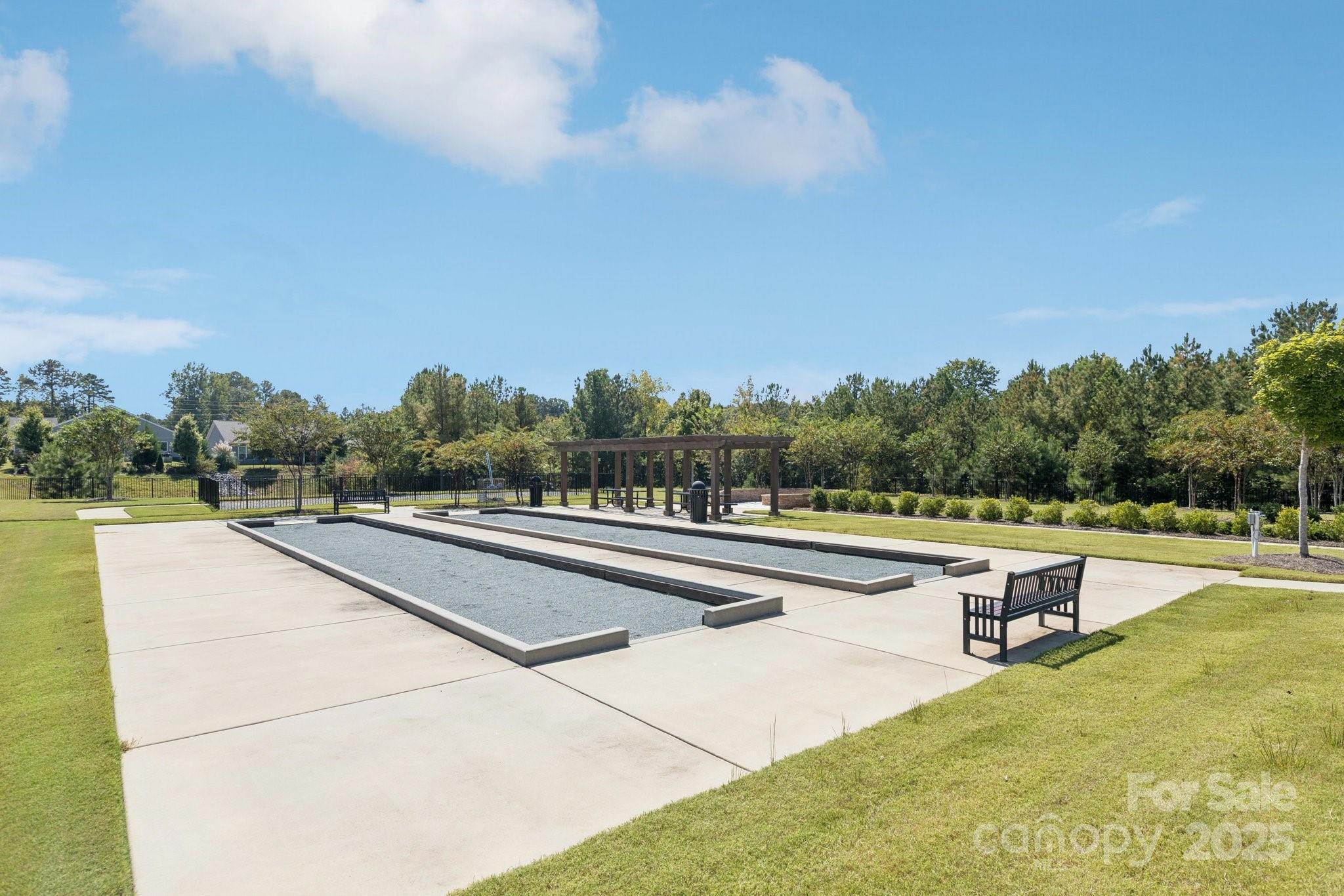 4236 Merrivale Drive Lancaster, SC 29720 - Photo 41 of 48 a view of swimming pool and trees in the background