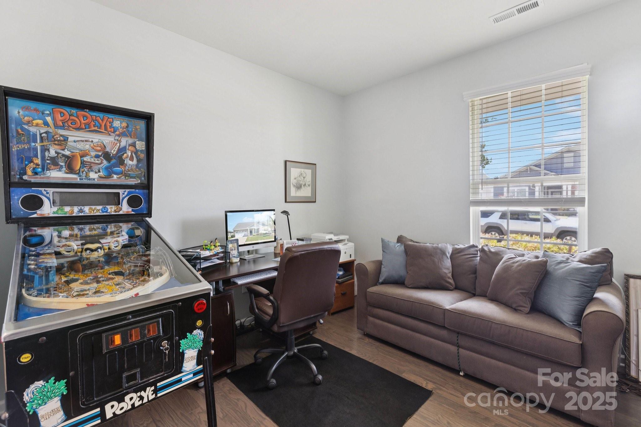 4236 Merrivale Drive Lancaster, SC 29720 - Photo 9 of 48 a living room with furniture a rug and a window