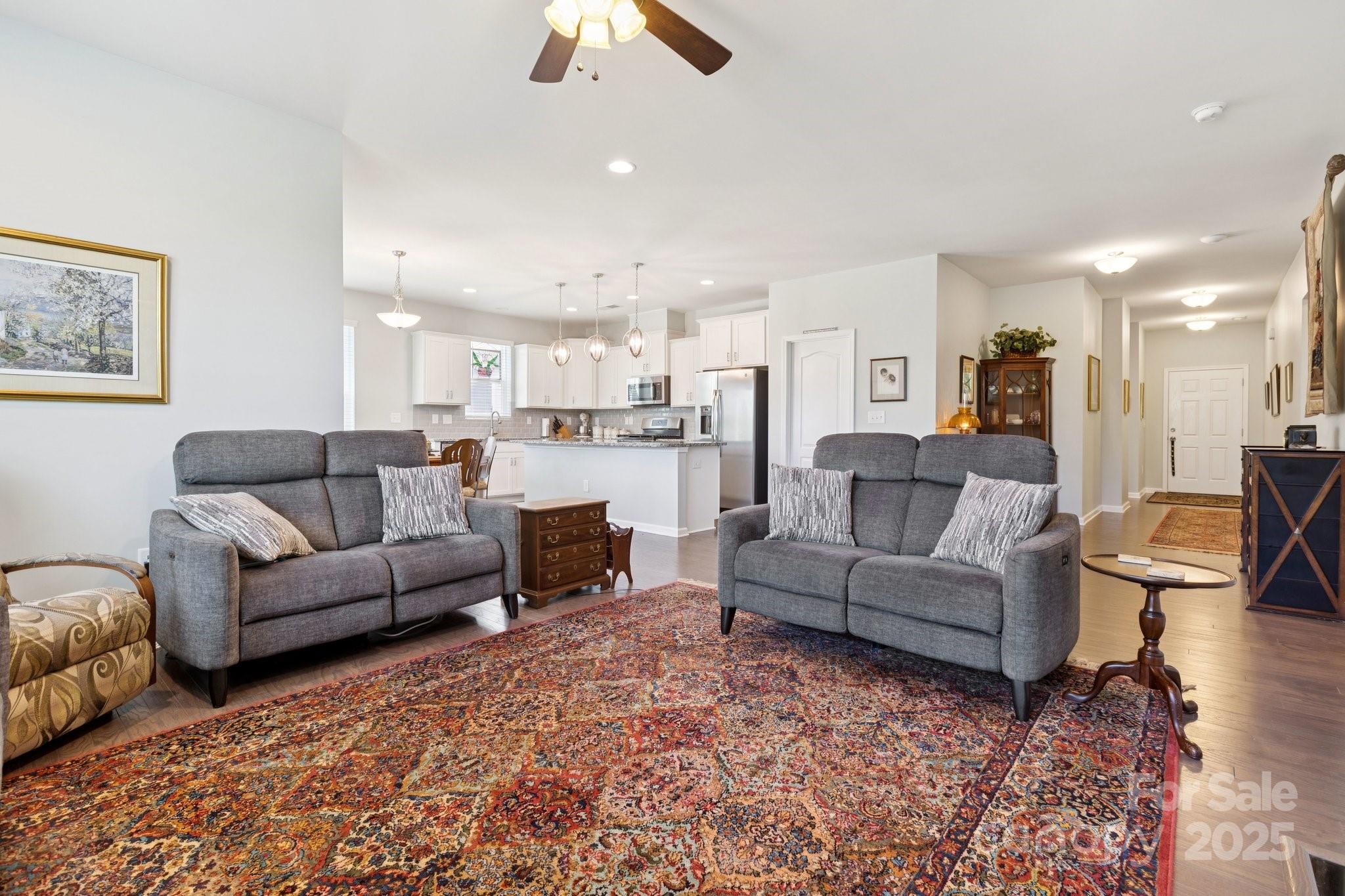 4236 Merrivale Drive Lancaster, SC 29720 - Photo 10 of 48 a living room with furniture and a fireplace