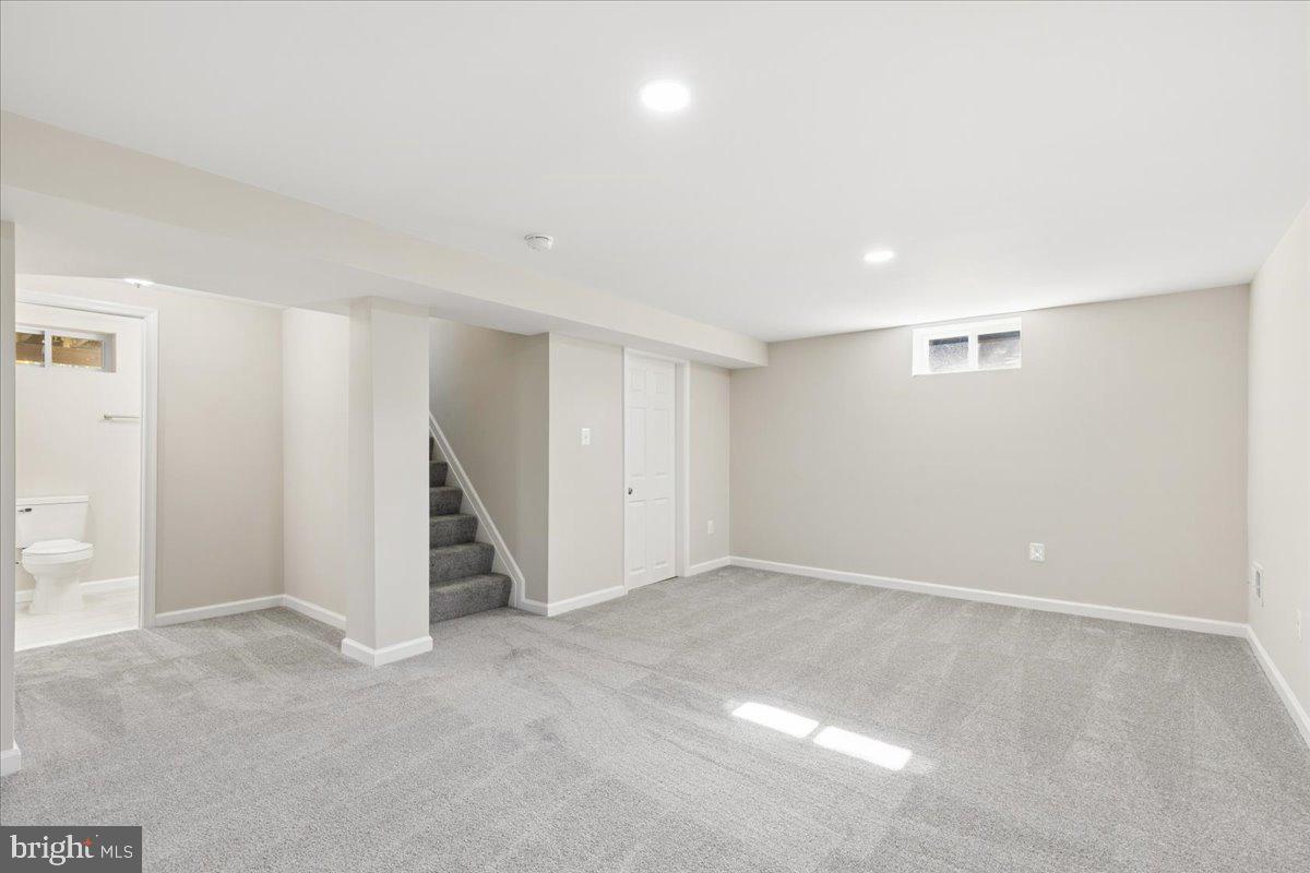 216 Cheddington Road Linthicum Heights, MD 21090 - Photo 40 of 60 wooden floor in an empty room