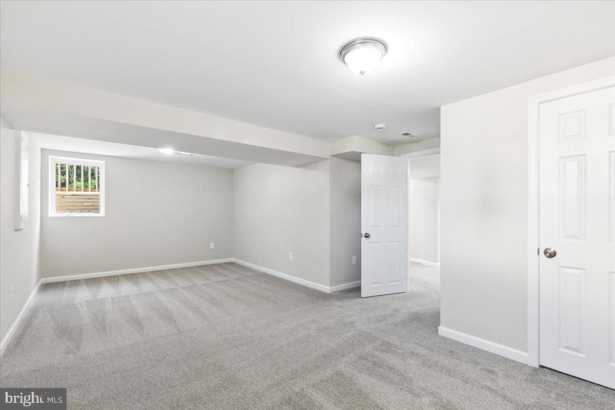 216 Cheddington Road Linthicum Heights, MD 21090 - Photo 43 of 60 a view of an empty room