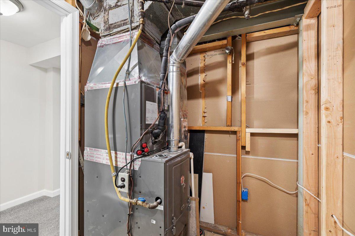 216 Cheddington Road Linthicum Heights, MD 21090 - Photo 47 of 60 a view of a storage room