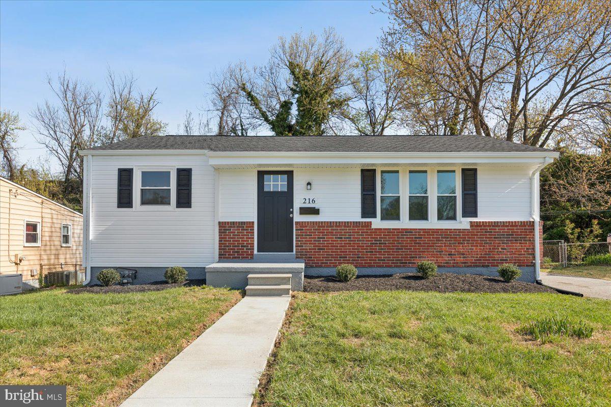 216 Cheddington Road Linthicum Heights, MD 21090 - Photo 5 of 60 a front view of house with yard and trees
