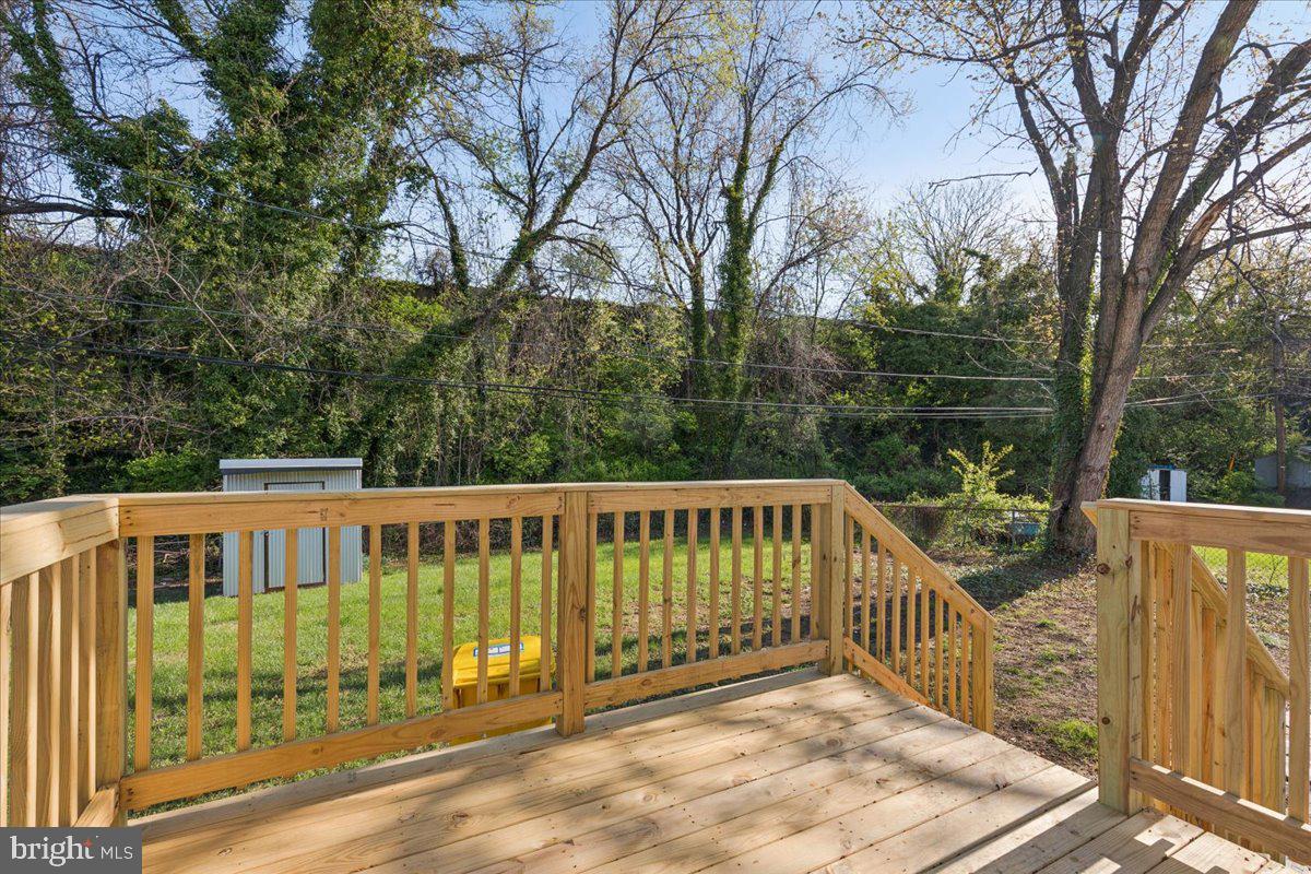 216 Cheddington Road Linthicum Heights, MD 21090 - Photo 51 of 60 a view of a deck with a backyard