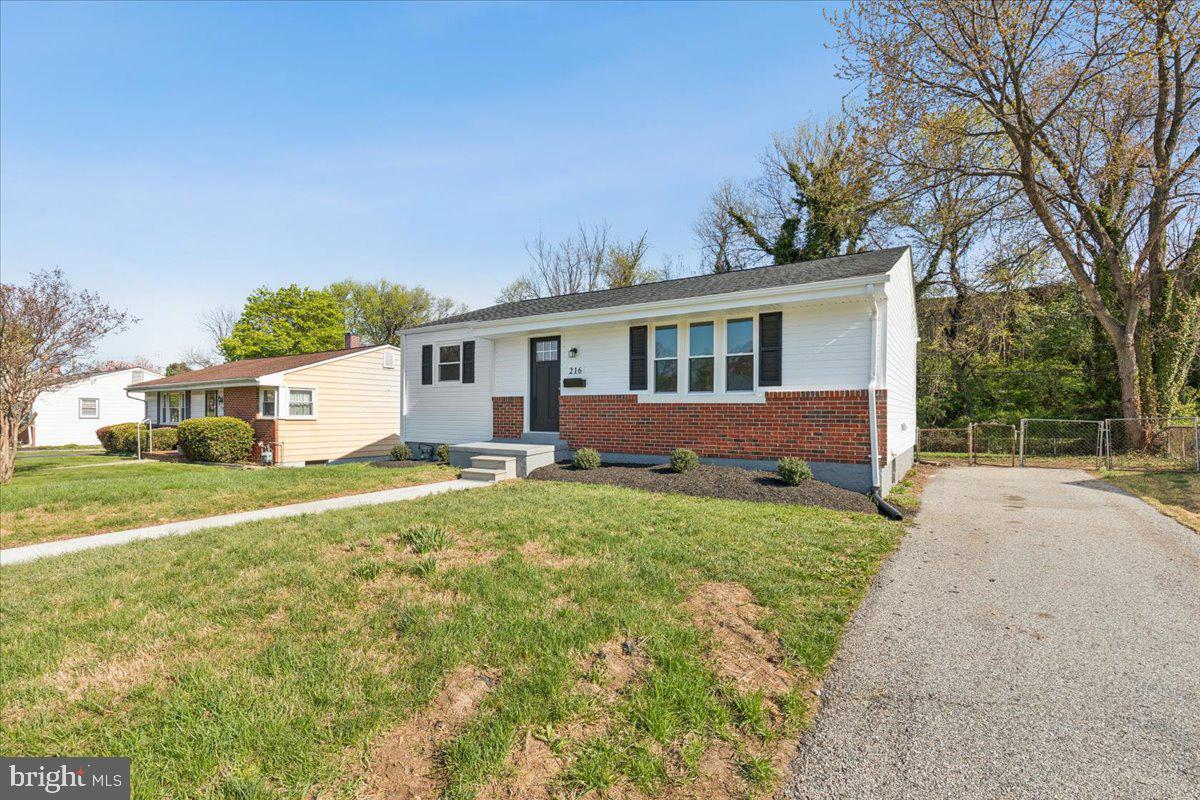 216 Cheddington Road Linthicum Heights, MD 21090 - Photo 7 of 60 a view of a house with a yard