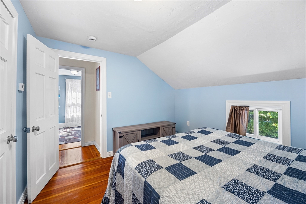 620 Whitney Street Gardner, MA 01440 - Photo 14 of 39 a bedroom with a bed and a window