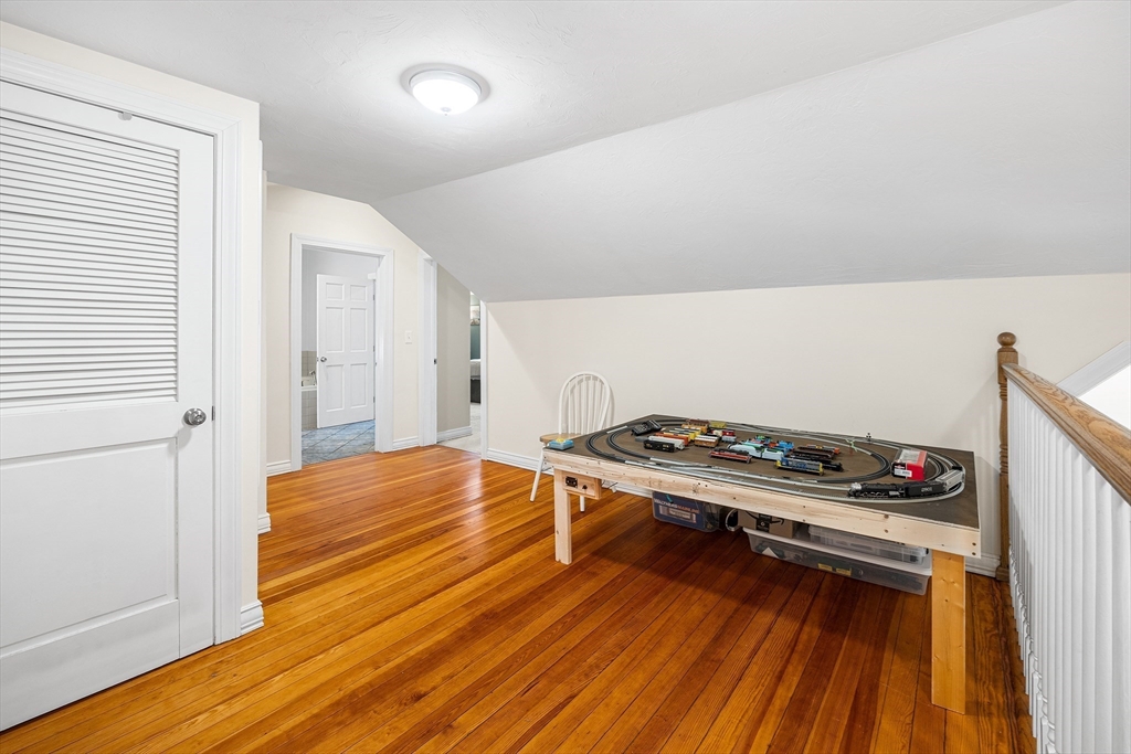 620 Whitney Street Gardner, MA 01440 - Photo 24 of 39 a bedroom with a bed and a dresser