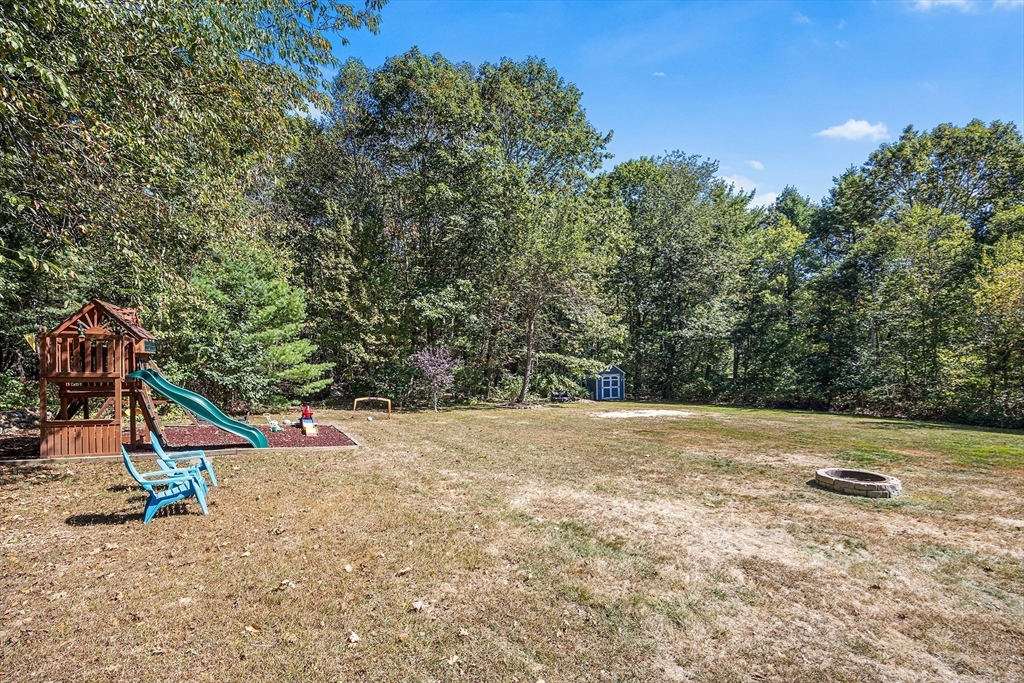 620 Whitney Street Gardner, MA 01440 - Photo 30 of 39 a view of a backyard of a house