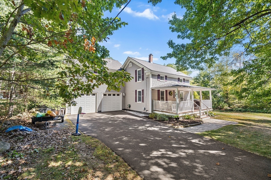 620 Whitney Street Gardner, MA 01440 - Photo 34 of 39 a view of a house with a yard