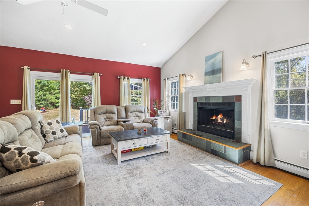 620 Whitney Street Gardner, MA 01440 - Photo 5 of 39 a living room with furniture and a fireplace