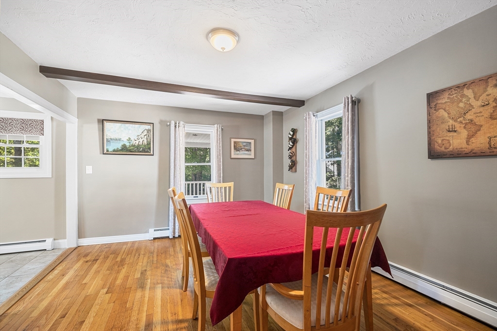 620 Whitney Street Gardner, MA 01440 - Photo 9 of 39 a view of a dining room with furniture window and wooden floor