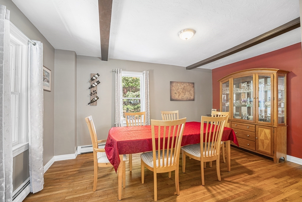 620 Whitney Street Gardner, MA 01440 - Photo 10 of 39 a view of a dining room with furniture window and wooden floor