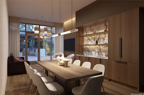 a room with wooden floor and large windows