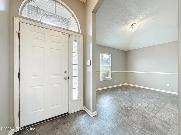 an empty room with a entryway