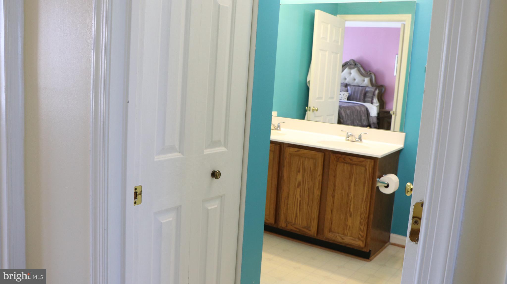 4048 Jasper Loop Dumfries, VA 22025 - Photo 20 of 29 Dual access doors for 2nd floor bath