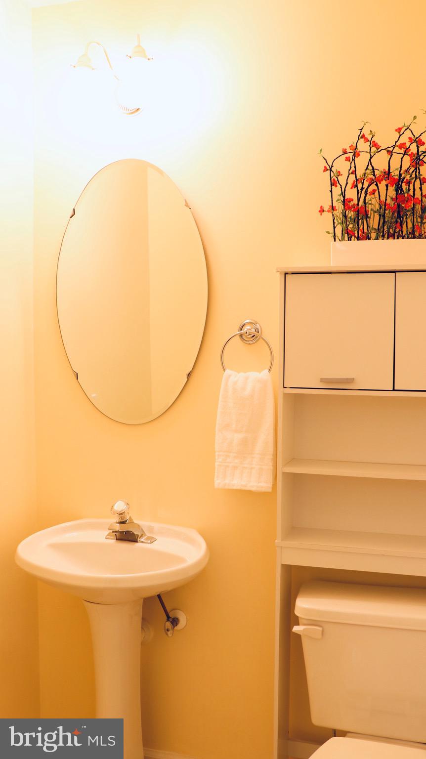 4048 Jasper Loop Dumfries, VA 22025 - Photo 8 of 29 Main level half bath
