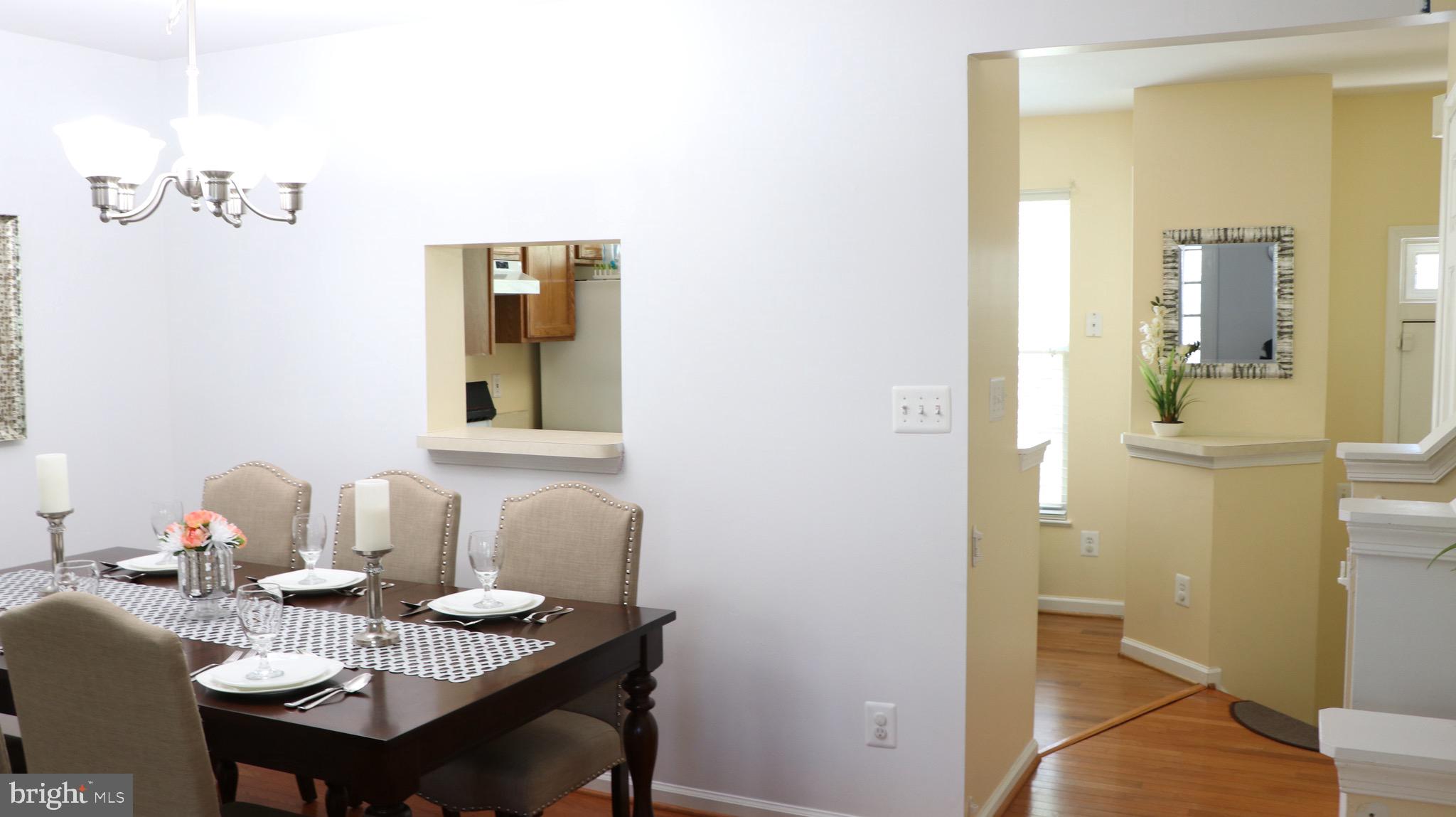 4048 Jasper Loop Dumfries, VA 22025 - Photo 9 of 29 Dining room close to kitchen